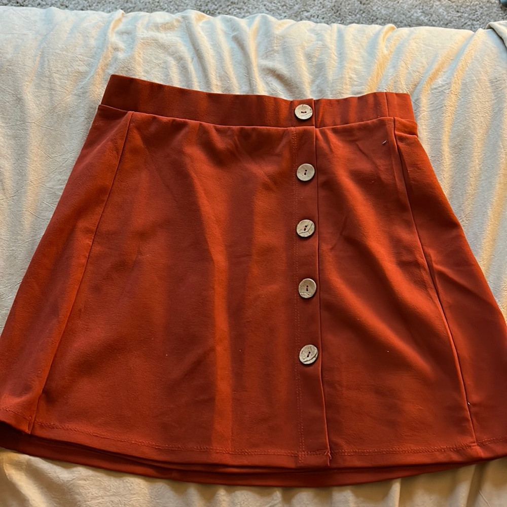 Mini skirt with buttons